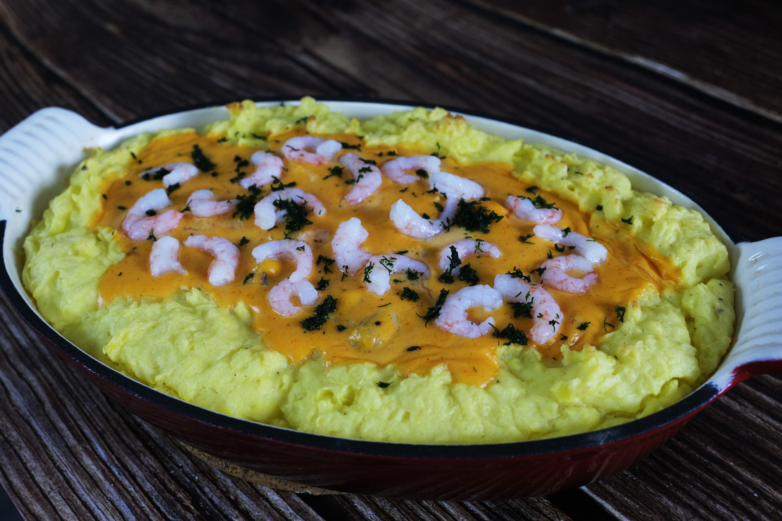 Fish Gratin with Salmon, Cod, Shrimps and White Wine Sauce