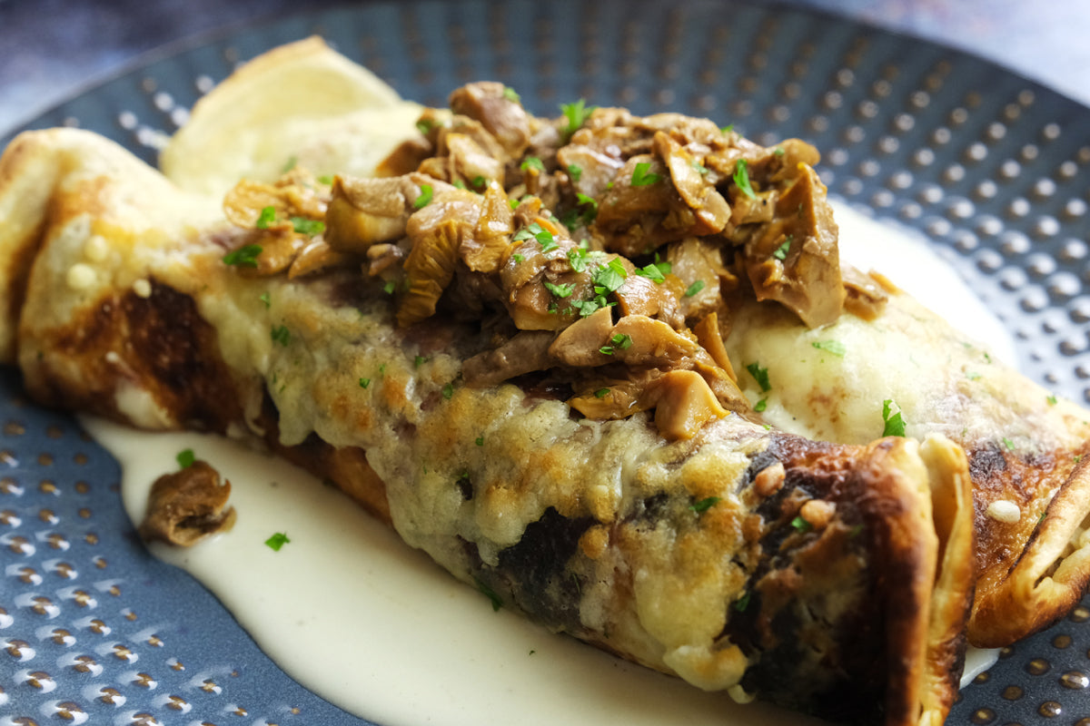 Chanterelle Crêpes with White Wine Cream Sauce and Herbs recipe