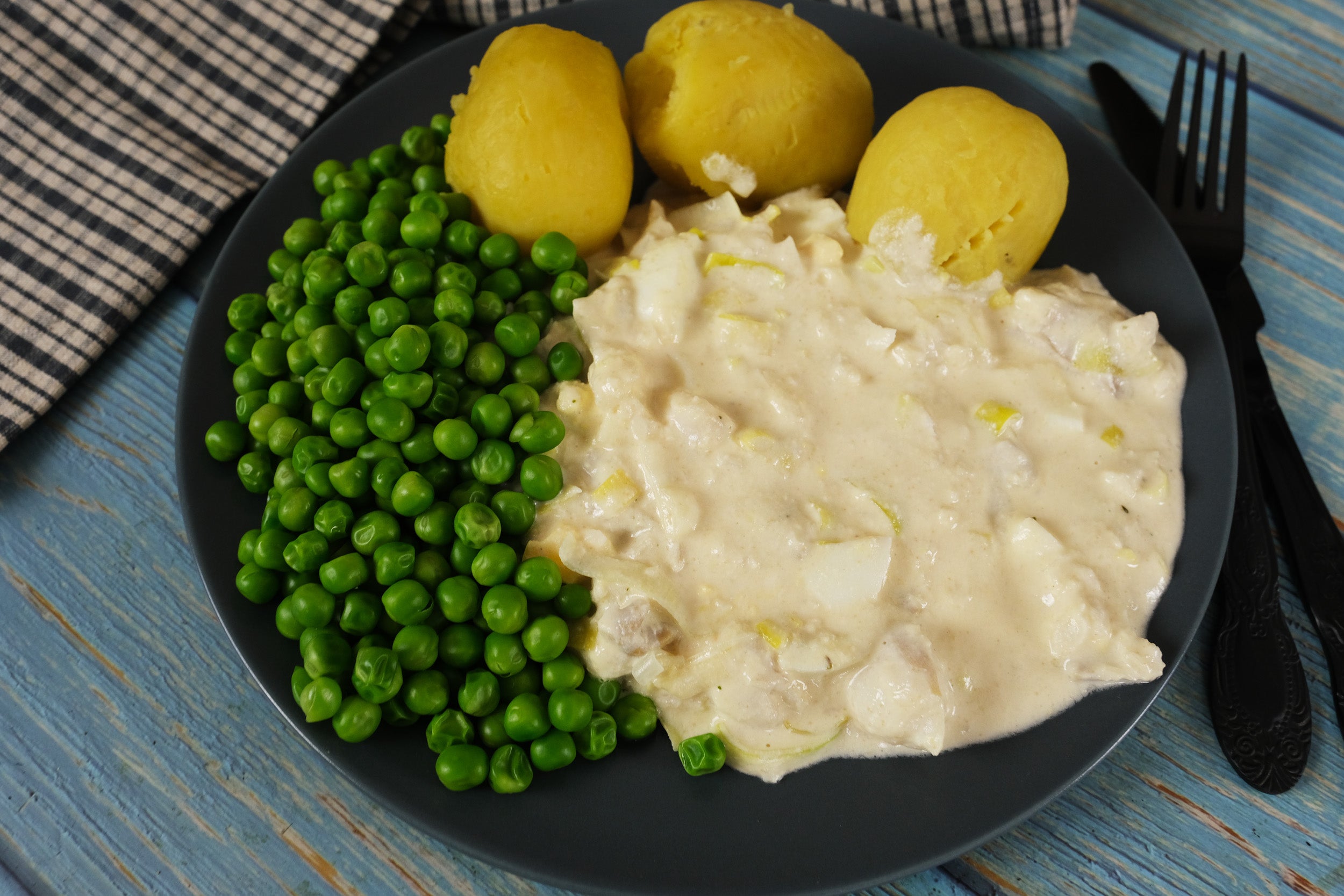 Cod Fish Casserole with Potatoes and Peas