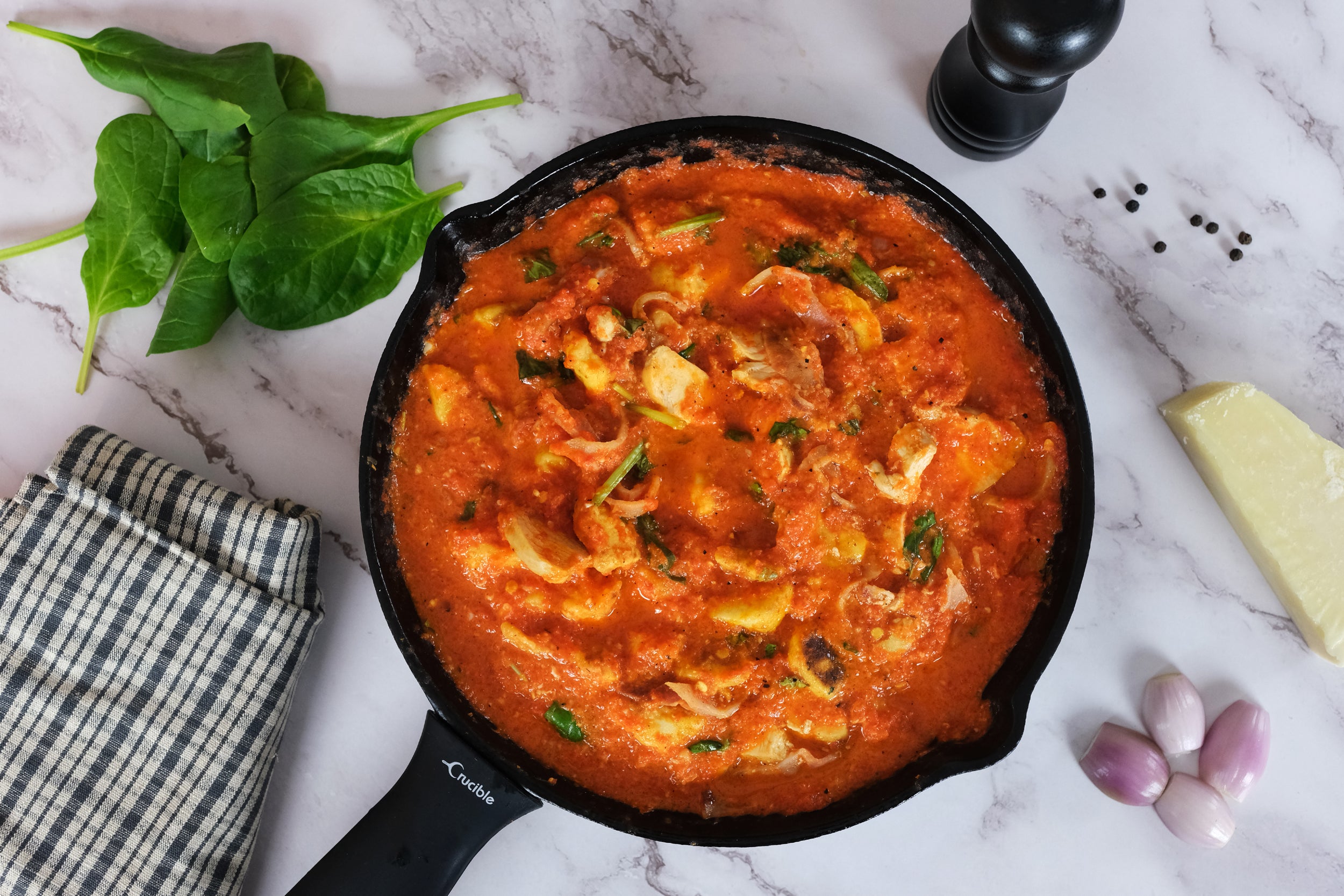 Gnocchi with bacon wrapped chicken and roasted red pepper sauce