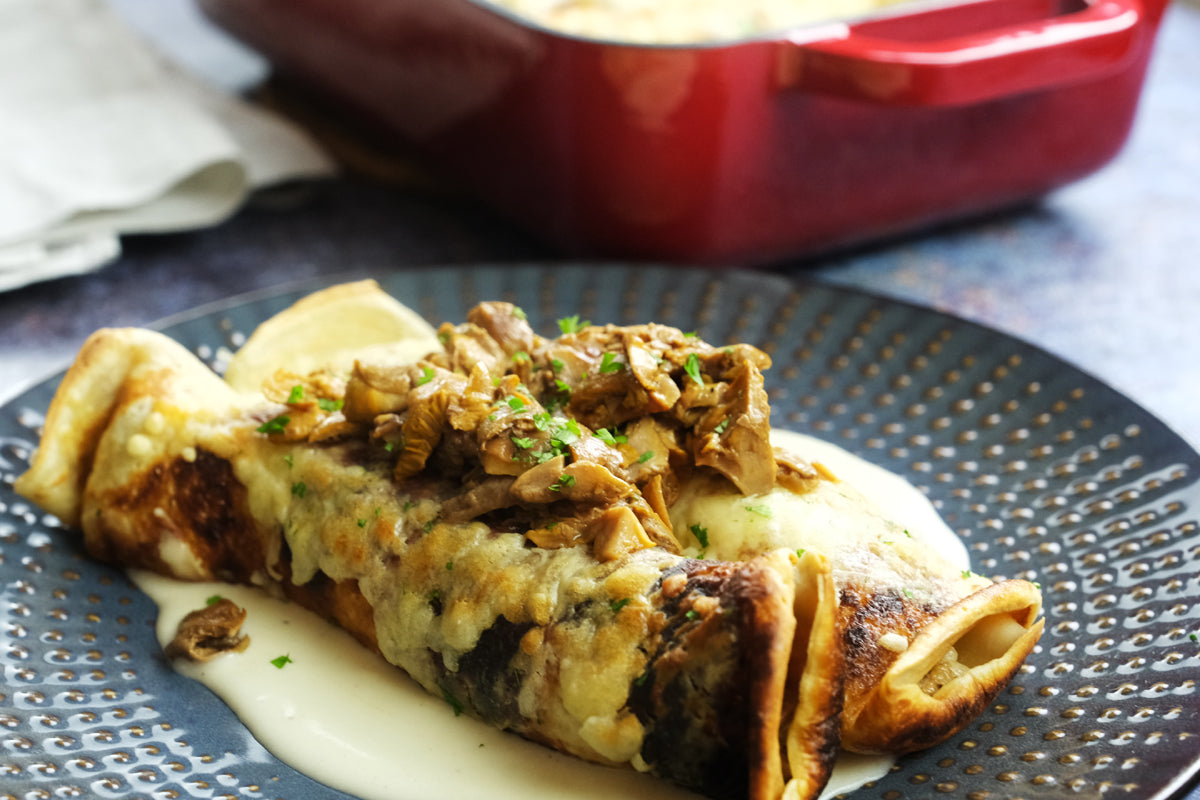 creped with an Enameled cast iron coasting pan baking dish from Direct-mart in the background